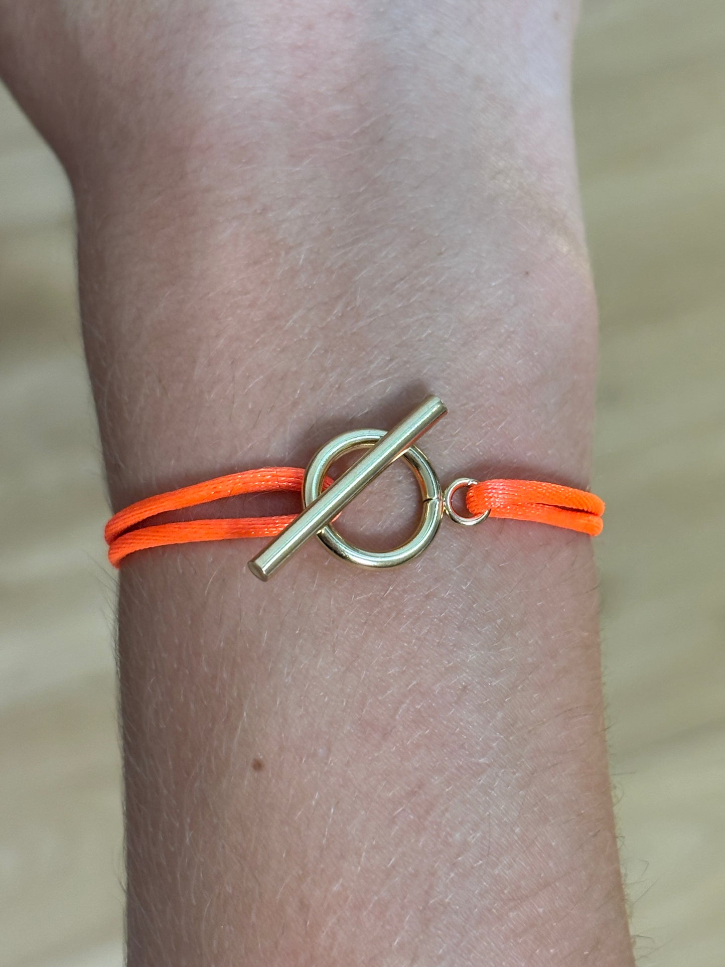 Bracelet cordon avec menottes